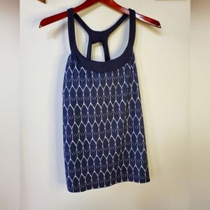 The North face Womens Athletic Racerback tank with built-in bra. SIZE L